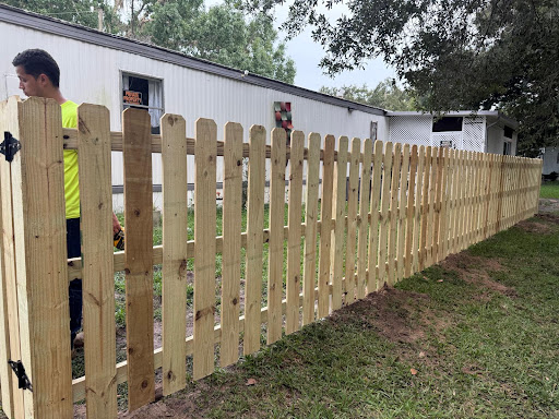 Fort Fence Masters crew installing a fence